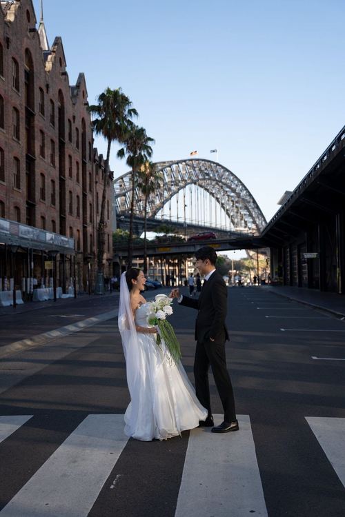 Frank and Seoyun at The Rocks beneath the Harbour Bridge